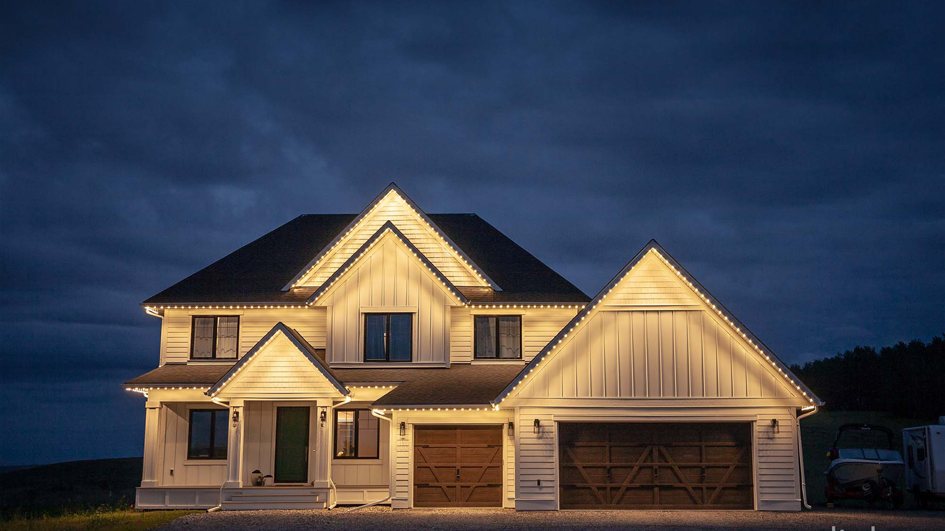Glowing house lights at dusk from CleveLED